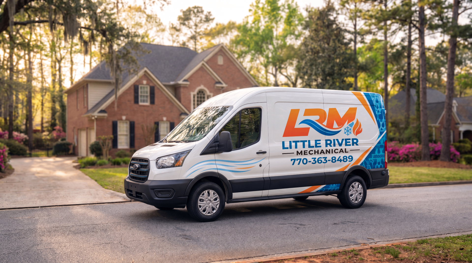Little River Mechanical service van parked outside a Woodstock, GA home